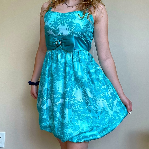 Secret Charm Dresses & Skirts - Pretty blue butterfly sundress w/ adjustable tie in back❤️ Perfect for sunny day